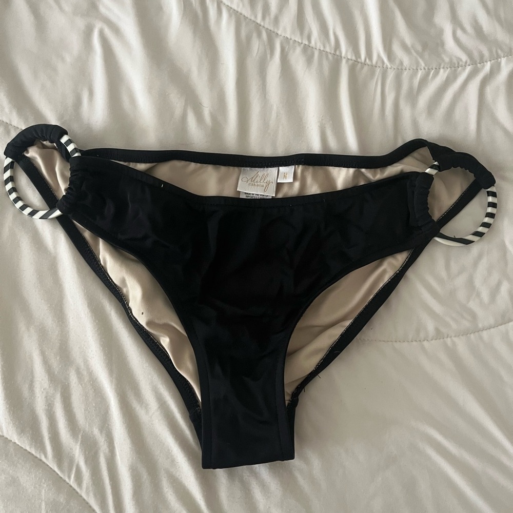 Milly bottoms with zebra details. Goes with any black or white top!